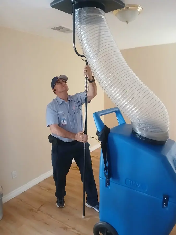 Mini Split Installation technician using HEPA equipment in Englewood
